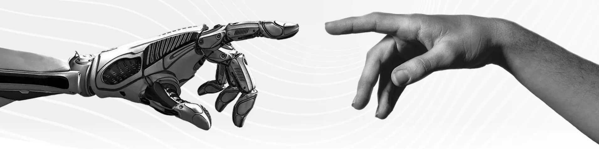A robotic hand and a human hand reaching toward each other